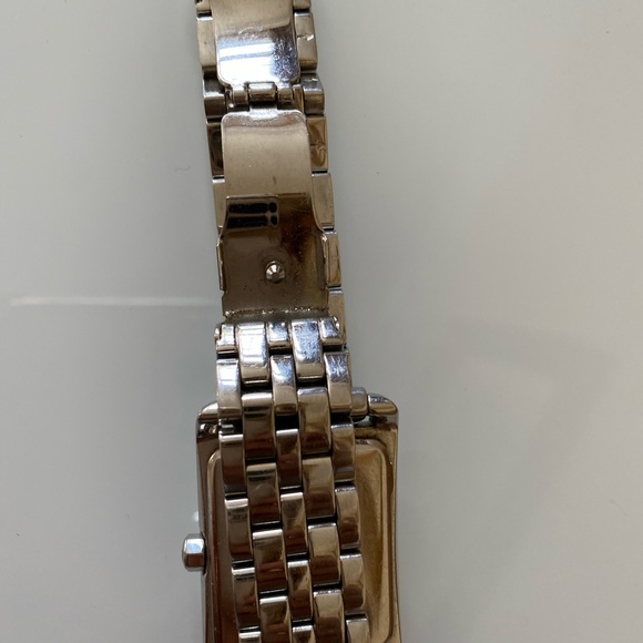 Michael Kors silver w surrounding crystals in excellent condition